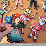 Anziehpuppe mit Weihnachtskleidung